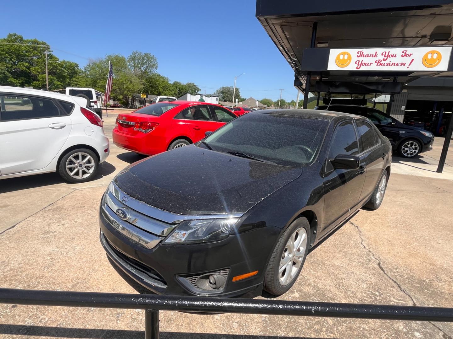 2012 BLACK FORD FUSION SE SE (3FAHP0HAXCR) with an 2.5L L4 DOHC 16V engine, located at 8101 E. Skelly Dr., Tulsa, OK, 74129, (918) 592-3593, 36.121891, -95.888802 - Photo#0